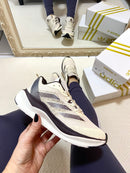 ADIZERO MARROM