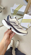 ADIZERO MARROM