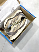 ADIZERO MARROM