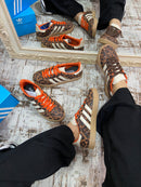 AD GAZELLE ONÇA/LARANJA