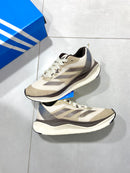 ADIZERO MARROM