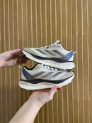 ADIZERO MARROM