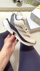 ADIZERO MARROM